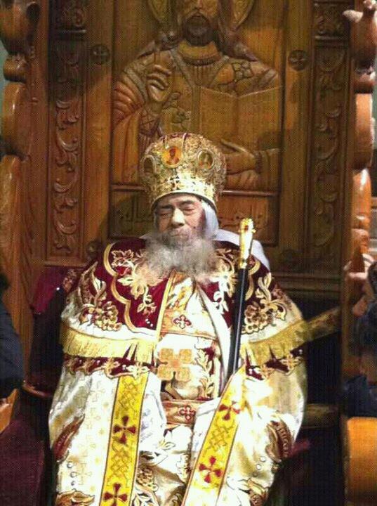 The body of His Holiness Pope Shenouda III placed on his throne in St. Mark's Cathedral during the Sunday Divine Liturgy following his departure 